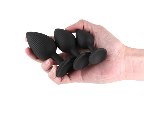 NS Novelties Renegade Triple Ace Textured Anal Plug Kit Black with Lube Channels - Butt Plugs